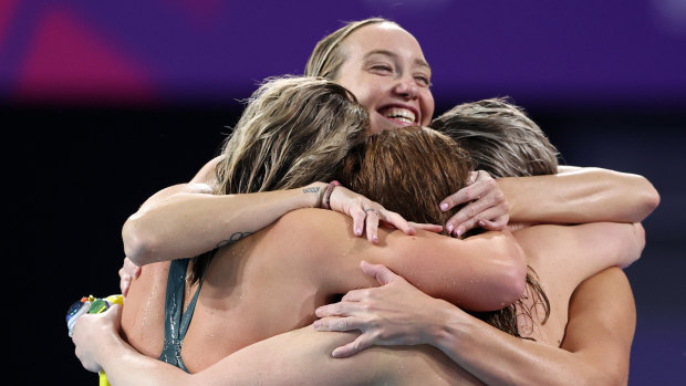 Australia’s record-breaking relay team celebrates gold.