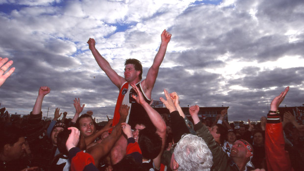 Danny Frawley chaired off after his last game in 1995.