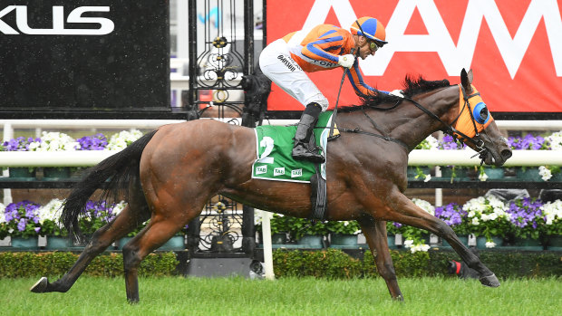 Jockey Opie Bosson steers Melody Belle to victory at the Empire Rose Stakes on Derby day.