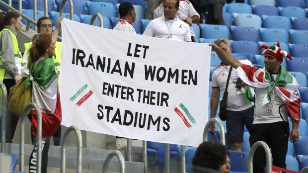 A banner calls for Iran to allow female supporters to attend local matches.