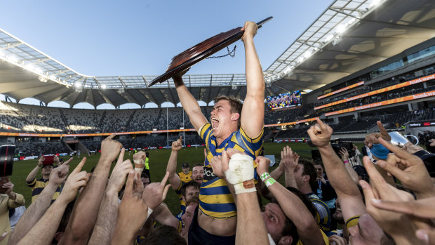 Sydney University's Guy Porter celebrates after winning back-to-back Shute Shield titles. 