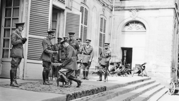 King George V knighting Sir John Monash at at the Australian Corps headquarters in France in 1918.