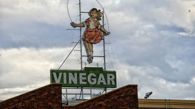 The Skipping Girl Vinegar neon above 651 Victoria Street.