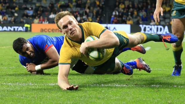 Dane Haylett-Petty crosses the paint for the Wallabies against Samoa last year at Bankwest Stadium. 