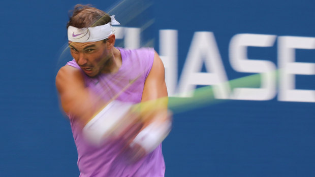 Blur of motion: Rafael Nadal returns a shot during his victory over Hyeon Chung of South Korea.