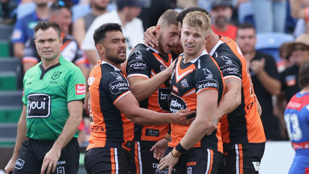 Party poopers: Tigers crash Pearce’s 300th celebrations with upset win