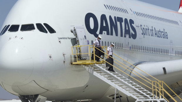 Qantas pilots leave an A380 after it was put into storage in California in July 2020.