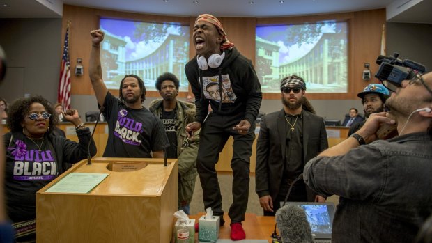 Stevante Clark, brother of Stephon Clark, stormed the Sacramento City Council chambers to protest the shooting death of his brother.