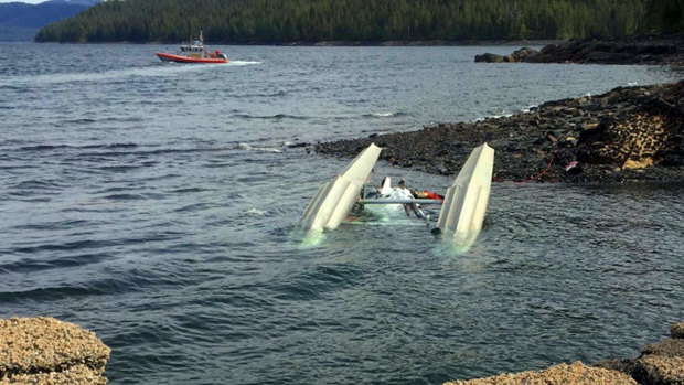 A response boat crew searches for survivors from a downed seaplane in the vicinity of George Inlet near Ketchikan, Alaska.