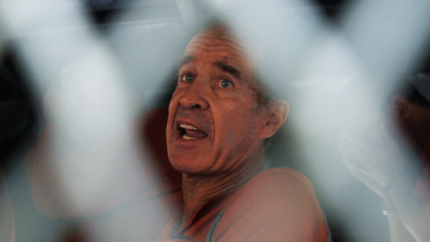 Australian filmmaker James Ricketson inside a prison van on his way to a hearing.