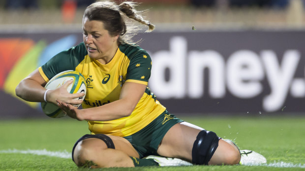 Amazing Grace: Hamilton scores one of her three tries at North Sydney Oval on Friday night.