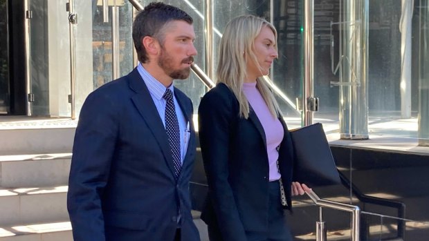 Lawyer David Funch (left) leaves Toowoomba Magistrates Court on Wednesday afternoon.