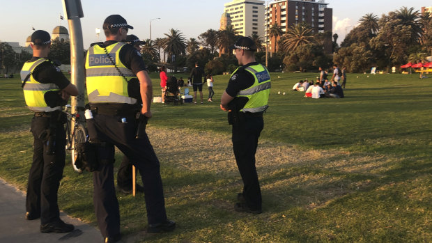 Police patrol St Kilda beach. 