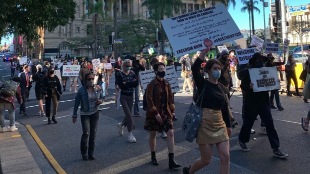 Protesters march through the Brisbane inner city towards the Home Affairs office, with chants of “no hate, no fear, refugees are welcome here”.
