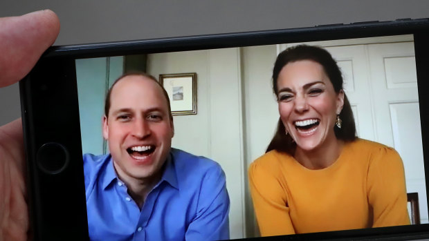 Prince William, Duke of Cambridge pictured on April 9, 2020, in a video chat with school students, alongside Catherine, Duchess of Cambridge. Sources say he contracted coronavirus in April. 