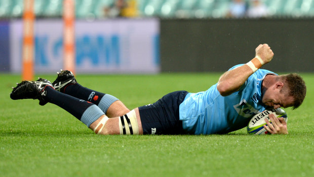 Streak-busters: Jed Holloway goes over for the Tahs.