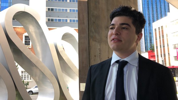 Suspended University of Queensland Drew Pavlou outside the courts in Brisbane on Monday. 