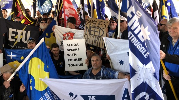 Unionists and striking Alcoa workers protesting outside parliament house in August.