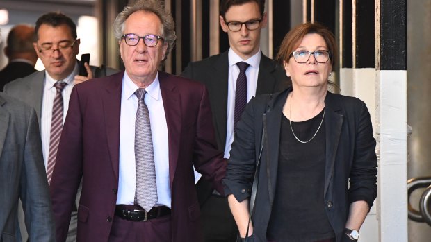 Geoffrey Rush outside court on Tuesday with wife Jane Menelaus.