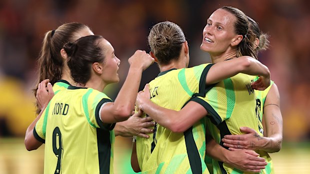 The Matildas celebrate.