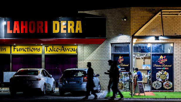 Lahori Dera, WAtoday / Good Food review. A group of friends leave Lahori Dera with cups of Kashmiri tea.