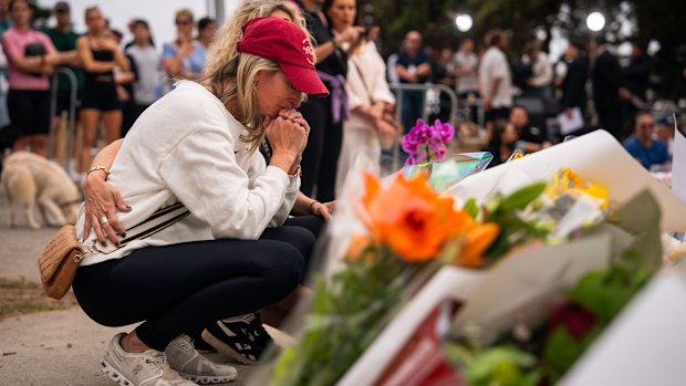 Jodie Gien visits the memorial at Bondi Pavilion, two days after the mass shooting at Bondi Beach.