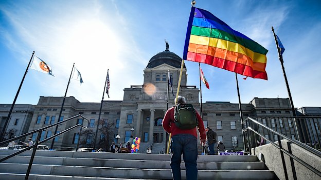 Demonstrators gather on the step of the Montana State Capitol in 2021 after the Senate Judiciary Committee voted to advance two bills targeting transgender youth despite overwhelming testimony opposing the measures.