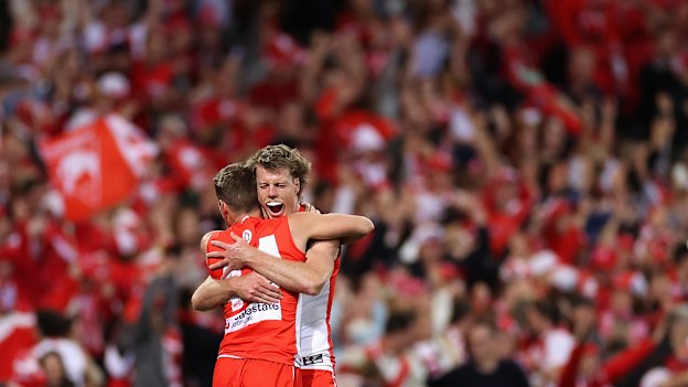 Jake Lloyd and Nick Blakey  celebrate their win over Collingwood in the preliminary final. 