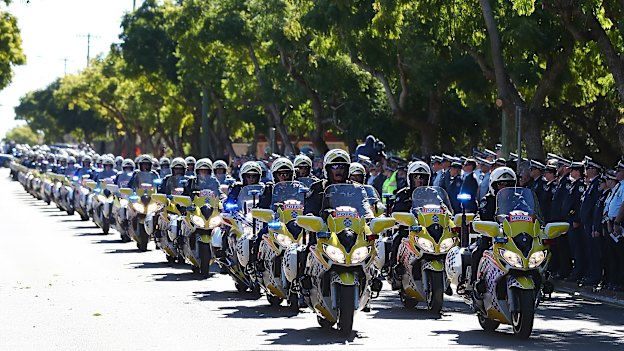The police convoy - which featured motorbike, horses and dogs - during the final goodbye to Senior Constable Brett Forte in Toowoomba on June 7, 2017.