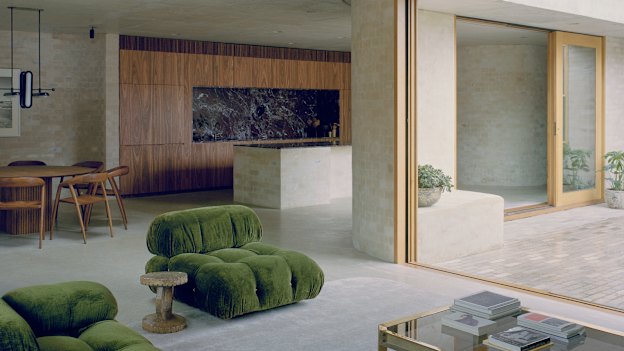 The residents wanted “a home that felt open and connected to a series of outdoor spaces ... that would allow their boys to play while also creating social areas for dining and entertaining.”