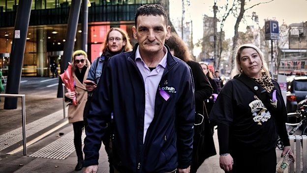 Danny Jeffcote marches on Thursday night for a vigil for victims of overdose in the CBD.
