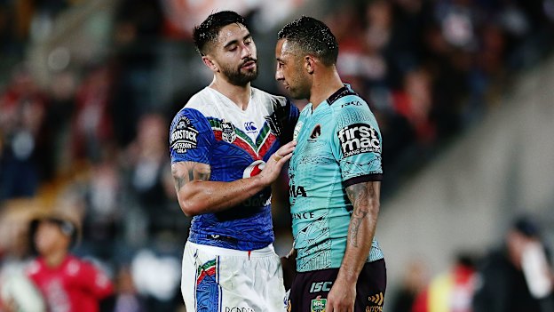 Shaun Johnson with his idol, Benji Marshall, while playing for the Warriors against the Broncos in 2017.