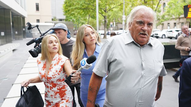 Jeffrey Corfe being questioned by reporters outside the County Court in February.