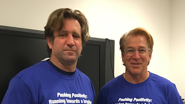 Power of positivity: Des Hasler with John Novak.