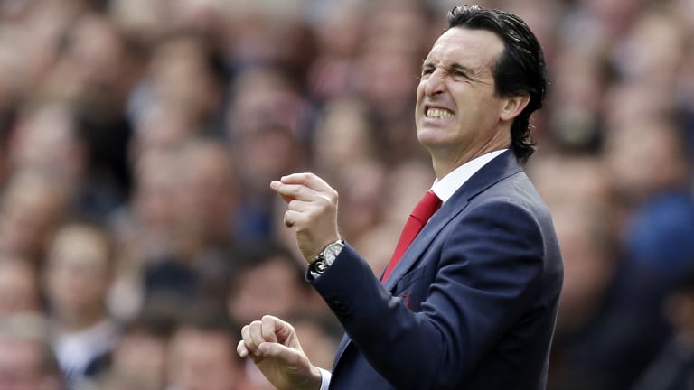 First points: Arsenal manager Unai Emery reacts during the clash with West Ham at Emirates Stadium.