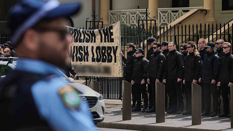 Swords, extremist material and Nazi salutes: Three men charged as part of federal police blitz