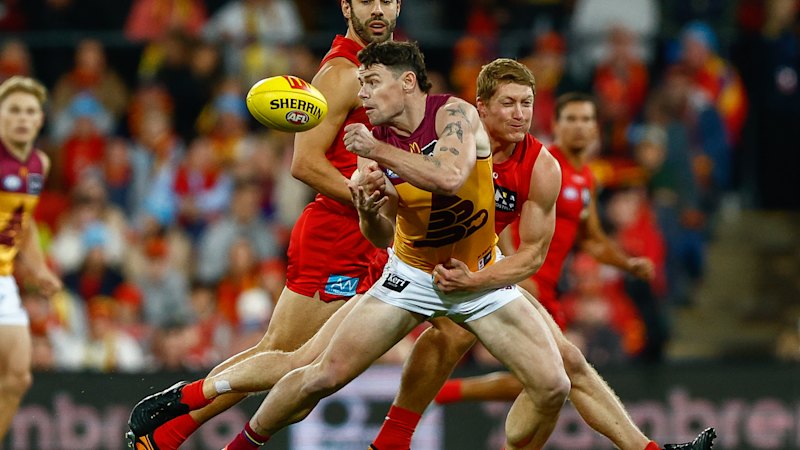 AFL LIVE: Suns, Lions fire up for sold out Q Clash; Dockers pile 19 goals in a row to obliterate the miserable Roos