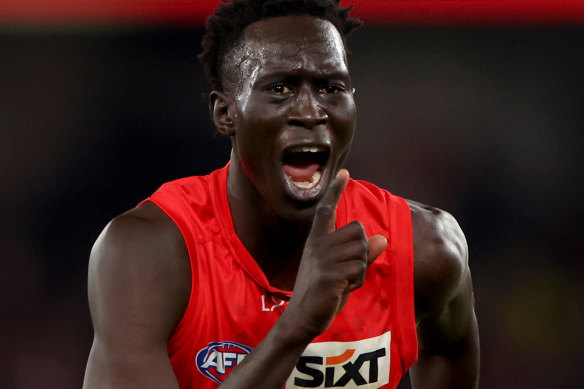 Mac Andrew silences the Essendon crowd after a clutch match-winning goal.