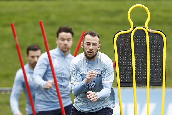 Adam Le Fondre and his Sydney FC teammates are put through their paces during their first training session since the COVID-19 shutdown.