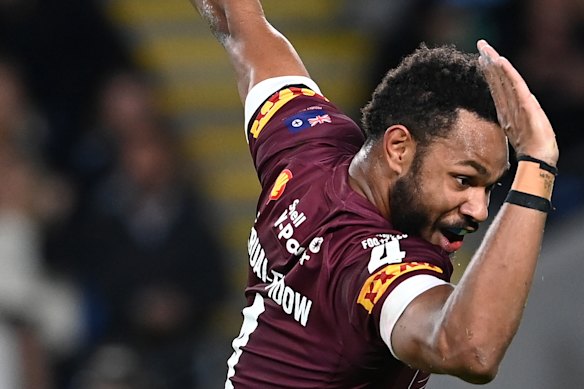 Hamiso Tabuai-Fidow shows off his shark celebration for the Maroons.
