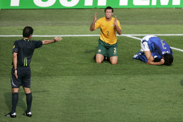 Lucas Neill concedes a late penalty for a tackle on Fabio Grosso at the 2006 World Cup.
