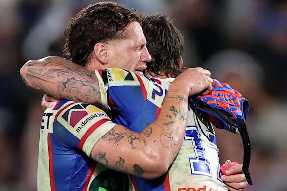 Kalyn Ponga and Dylan Lucas celebrate Newcastle’s unlikely victory.