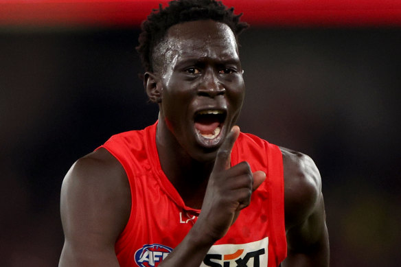 Mac Andrew silences the Essendon crowd after a clutch match-winning goal.
