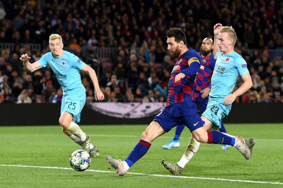 Lionel Messi misses a shot for Barcelona in their Champions League match against Slavia Prague.
