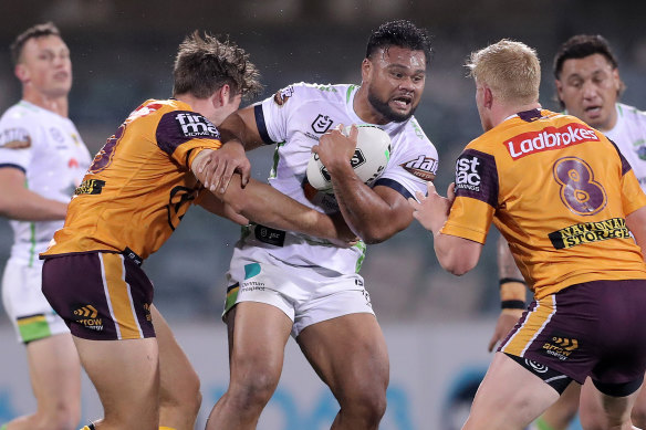 Dunamis Lui is tackled at GIO Stadium.