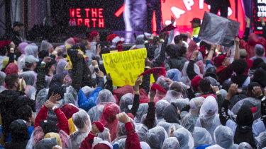 It's raining in Toronto, but the crowds are still piling up at 'Jurassic Park' outside the stadium.