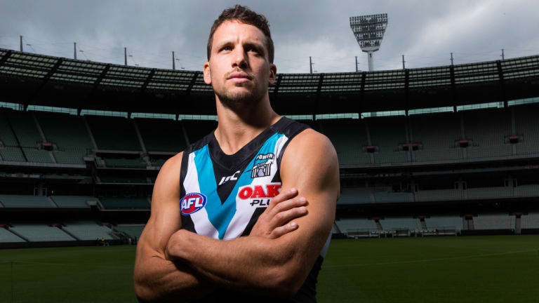 Travis Boak has stood down as Port Adelaide captain.