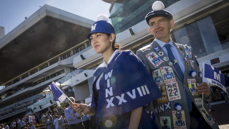 Familial fans ... Angela and Lloyd Menz have channeled their love of Winx into their racing fashions.