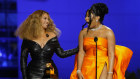 Beyonce, left, and Megan Thee Stallion accept the award for best rap song for “Savage” at the 63rd annual Grammy Awards at the Los Angeles Convention Center on Sunday, March 14, 2021. (AP Photo/Chris Pizzello)