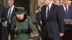 The Queen is escorted by Prince Andrew at Westminister Abbey.